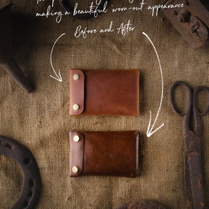 May include: Two brown leather wallets, one with a lighter brown patina, on a burlap background. The text "The patina will grow stronger with time making a beautiful worn-out appearance Before and After" is written above the wallets.