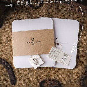 May include: Two white boxes with brown paper inserts. The boxes are labeled "Crazy Horse Craft - MMXV". The boxes are on a brown burlap background.