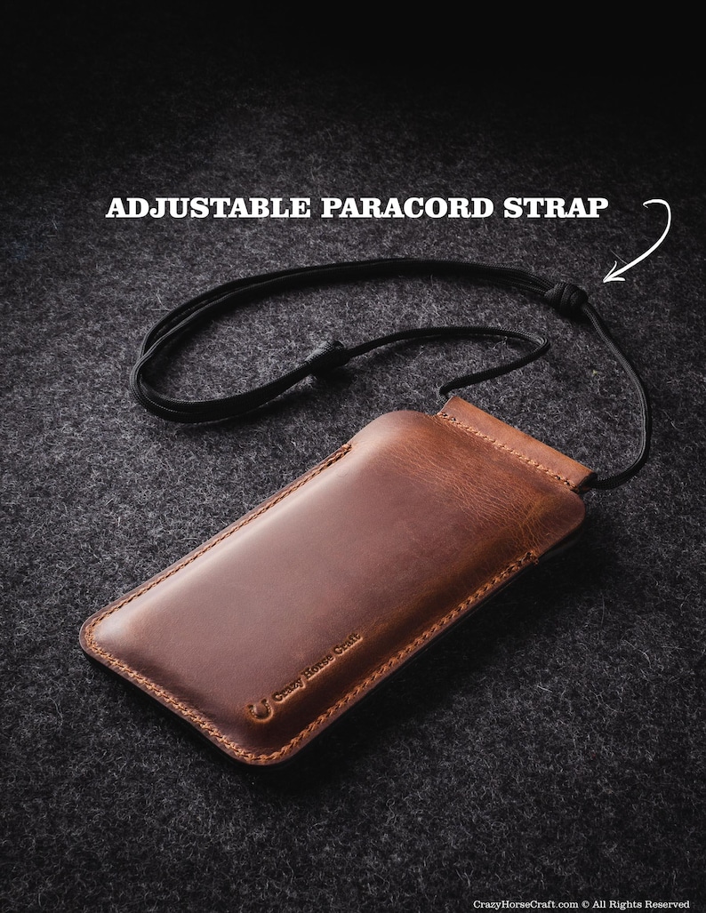 May include: A brown leather phone case with an adjustable paracord strap. The case has the text "Crazy Horse Craft" embossed on it.