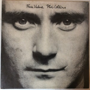 May include: Black and white photograph of Phil Collins for his album "Face Value".
