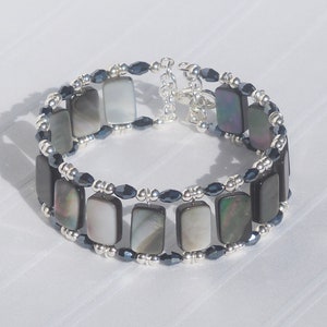 Black shell and black iris glass cuff style memory wire bracelet