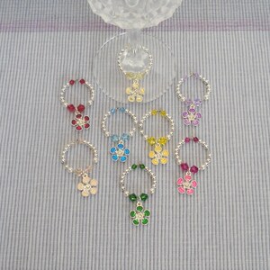 Enameled flower wine charms - set of 8