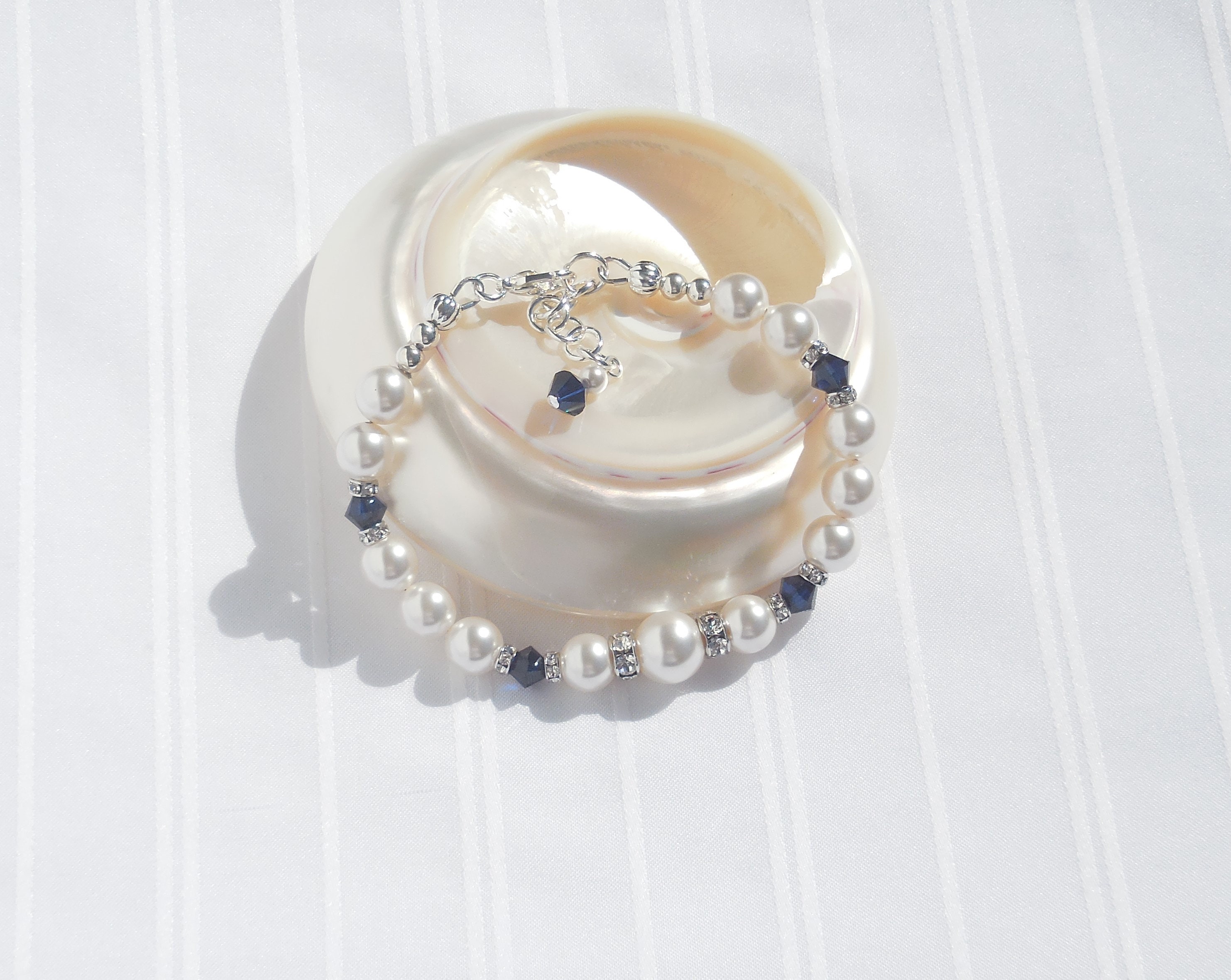 Swarovski white pearl and dark blue crystal bracelet | Etsy