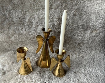 Set of three vintage brass angel taper candleholders. MCM. Very sweet trio!