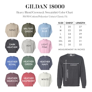 May include: Color chart for Gildan 18000 heavy blend crewneck sweatshirts. The chart shows 12 different colors, including sand, military green, light blue, dark heather, ash, light pink, heather royal, heather green, heather navy, heather maroon, heather raspberry, and white. The chart also includes a size chart with chest and length measurements in inches.