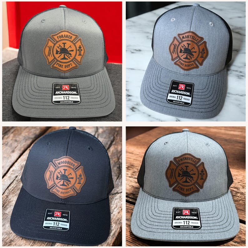 May include: Four trucker hats featuring a leather patch with a fire department emblem. Each hat displays a unique name like Foraker, Martelle, Woodburn, or Owensville, along with a Richardson 112 sticker on the brim. The caps have mesh backs.