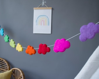 Rainbow garland with clouds in bright colours