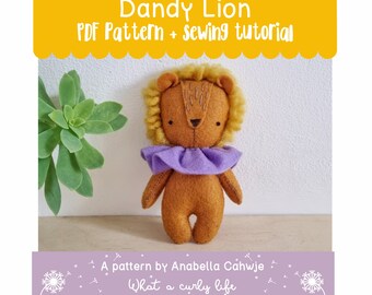 May include: A PDF sewing pattern and tutorial for making a felt lion toy. The lion is brown with a purple collar and yellow mane. The text "Dandy Lion" and "What a curly life" is visible in the image.