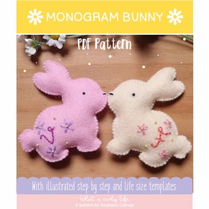 May include: Two felt bunny plushies, one pink and one white, with embroidered flowers and letters. The bunnies are kissing. The text "MONOGRAM BUNNY" and "PDF Pattern" is visible at the top of the image.