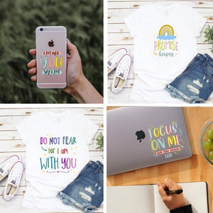 May include: Four different designs for t-shirts and phone cases with inspirational quotes. The designs feature colourful, handwritten text with a rainbow, stars, and hearts. The quotes are "I am who you say I am", "Promise keeper", "Do not fear for I am with you", and "Focus on me, not the storm - God".