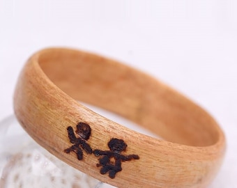 Women wooden engagement ring with personal pyrography. Customizable wedding ring in recycled maple sugar wood, handcrafted in Montreal