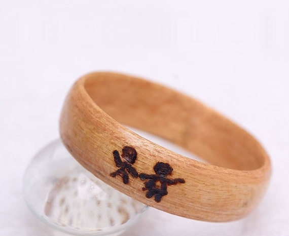 Women wooden engagement ring with personal pyrography. Customizable wedding ring in recycled maple sugar wood, handcrafted in Montreal