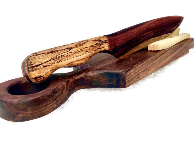 Design wooden knife with cutting board. Can be used as a wooden cheese knife or an envelope opener. Handcrafted in Canada