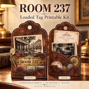 May include: A printable kit featuring two brown, textured, scalloped-top tags labeled ROOM 237. The front tag displays a vintage cafe scene, a brass key charm, and postage stamps. The back tag holds a Grand Hotel guest account card and a compass.