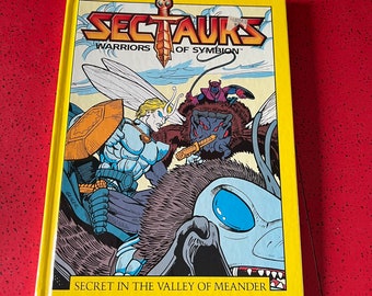 VTG 80s Sectaurs Warriors Of Symbion Secret In The Valley Meander Marvel Book.  Condition: great overall, awesome graphic illustration  See