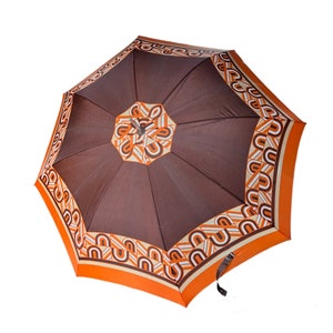 Vintage 1960s Mod Mcm Umbrella J Smooth Brown Orange Abstract Lucite Handle Condition: great overall, no noticeable holes or stains. Works