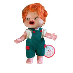Vintage Collectible Doll Red Head Fresh Kid Doll With Tag Hong Kong Condition tounge is missing, a few scuffs on face
