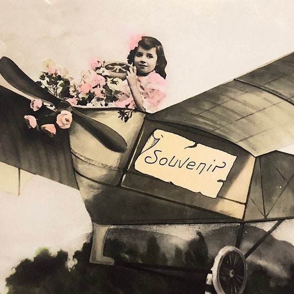 Antique postcard with little girl flying an airplane RPPC CPA rare photo French souvenir