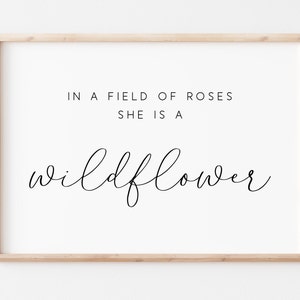 in a field of roses, she is a wild flower - JAW Signs Designs