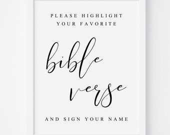 May include: White sign with black text that reads "Please highlight your favorite bible verse and sign your name".