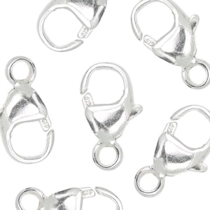 May include: Six silver lobster clasps, a type of jewelry finding used for attaching chains or cords to necklaces, bracelets, or other jewelry pieces.