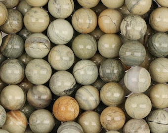 Peut inclure: Gros plan sur un ensemble de perles sphériques polies, dans des tons de vert, gris et beige. Chaque perle présente un motif marbré unique avec des veines naturelles. Idéal pour la création de bijoux ou d'autres projets artisanaux.