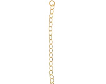 May include: A gold-colored chain extender with oval links and a small ring at the top. The chain is shown against a white background. The bottom of the chain has a small ring and a clasp. The words "MADE IN USA" are printed on a small American flag.