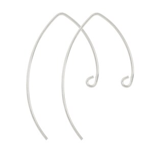 May include: A pair of silver-toned hoop earrings with a curved, open design.
