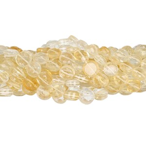 May include: A strand of light yellow citrine gemstone beads. The beads are oval-shaped and faceted, with a translucent appearance. The color varies from pale yellow to a deeper golden hue.
