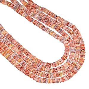 May include: A multi-strand necklace composed of small, flat, circular shell beads in variegated shades of orange, coral, pink, and pale yellow. The beads are strung together in several parallel rows, creating a textured, layered appearance.
