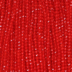Puede incluir: Primer plano de un vibrante collar de cuentas rojas. Las cuentas son pequeñas, facetadas y espaciadas uniformemente, creando una superficie texturizada. El color es un rojo intenso y saturado, con luz reflejada en las facetas.