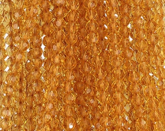 4mm Round Faceted Glass Beads Golden Brown(GLRD400173)