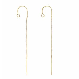 May include: A pair of gold-toned chain earrings with a hook closure. The chains are long and thin, and the hooks are simple and elegant.