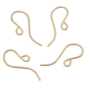 May include: Five gold-toned earring hooks, also known as ear wires, are arranged in a starburst pattern on a white background.