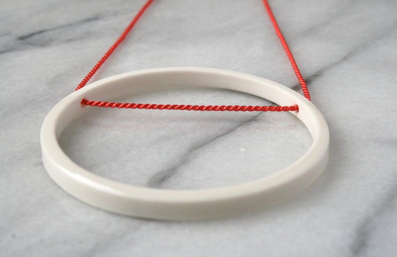 white minimalist circle pendant on bright orange silk / 12th, 18th, 20th anniversary gift / ceramic handmade jewelry / gift for her image 3