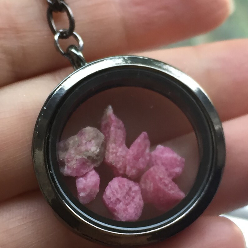 Tugtupite locket pendant