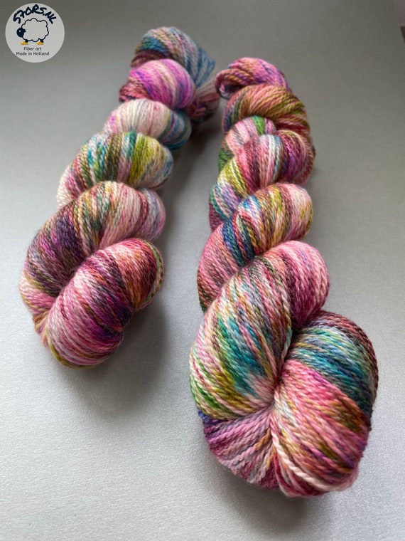 Hand dyed Polwarth and Tussah silk sock yarn. Dark confetty.