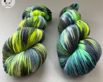 Hand dyed superwash Merino DK weight yarn. Fluoriscent green ‘Northernlight’.