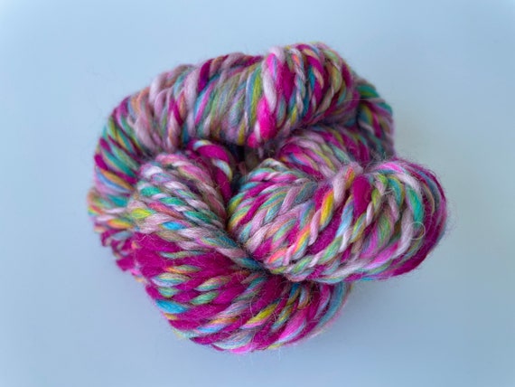 Mini skein hand spun merino in candy colors.