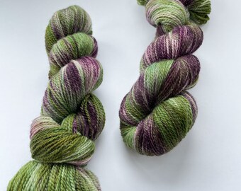 Hand dyed sock weight yarn. Superwash Merino, nylon and stellina glitter. ‘Avacado salad’