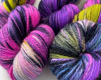 Hand dyed sock weight yarn. Superwash Merino, nylon and stellina glitter. 'Discotheque'.