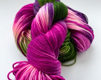 Hand dyed superwash Merino and nylon DK weight yarn. ‘Berry Bush’