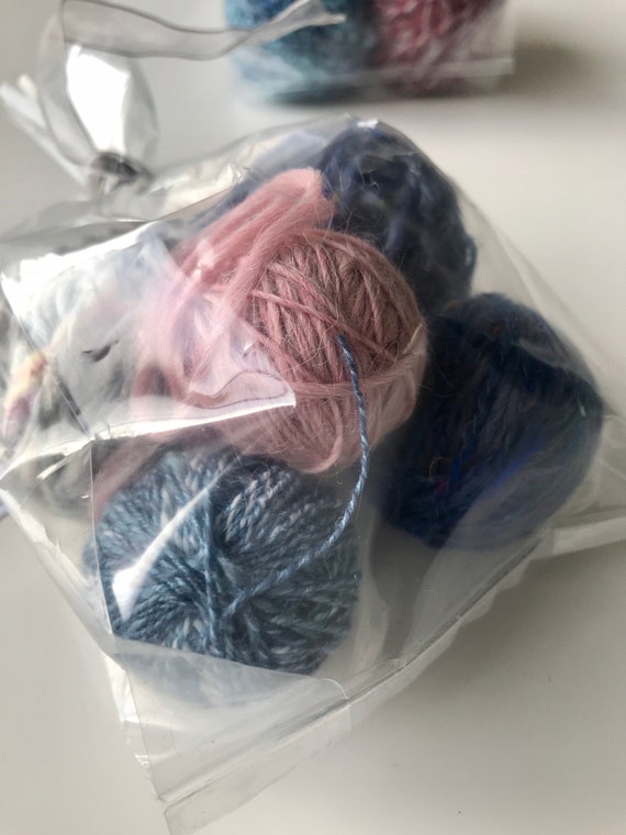 Bobbin leftover yarns. About 50 grams of handspun art yarn. Ideal for scrapbooking or weaving.