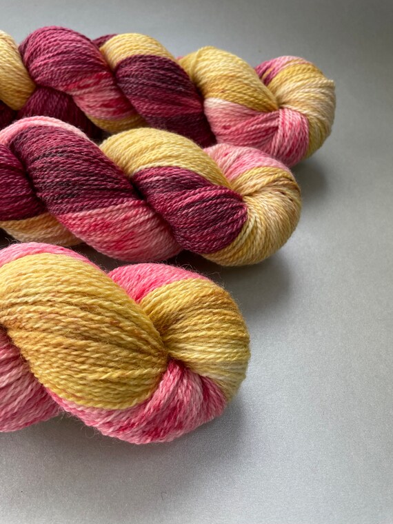 Hand dyed super wash Merino and bamboo sock weight yarn ‘Plum harvest’.