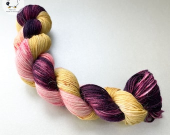 Hand dyed superwash superfine Merino, Alpaca and mulberry silk fingering weight yarn. ‘Plum harvest’