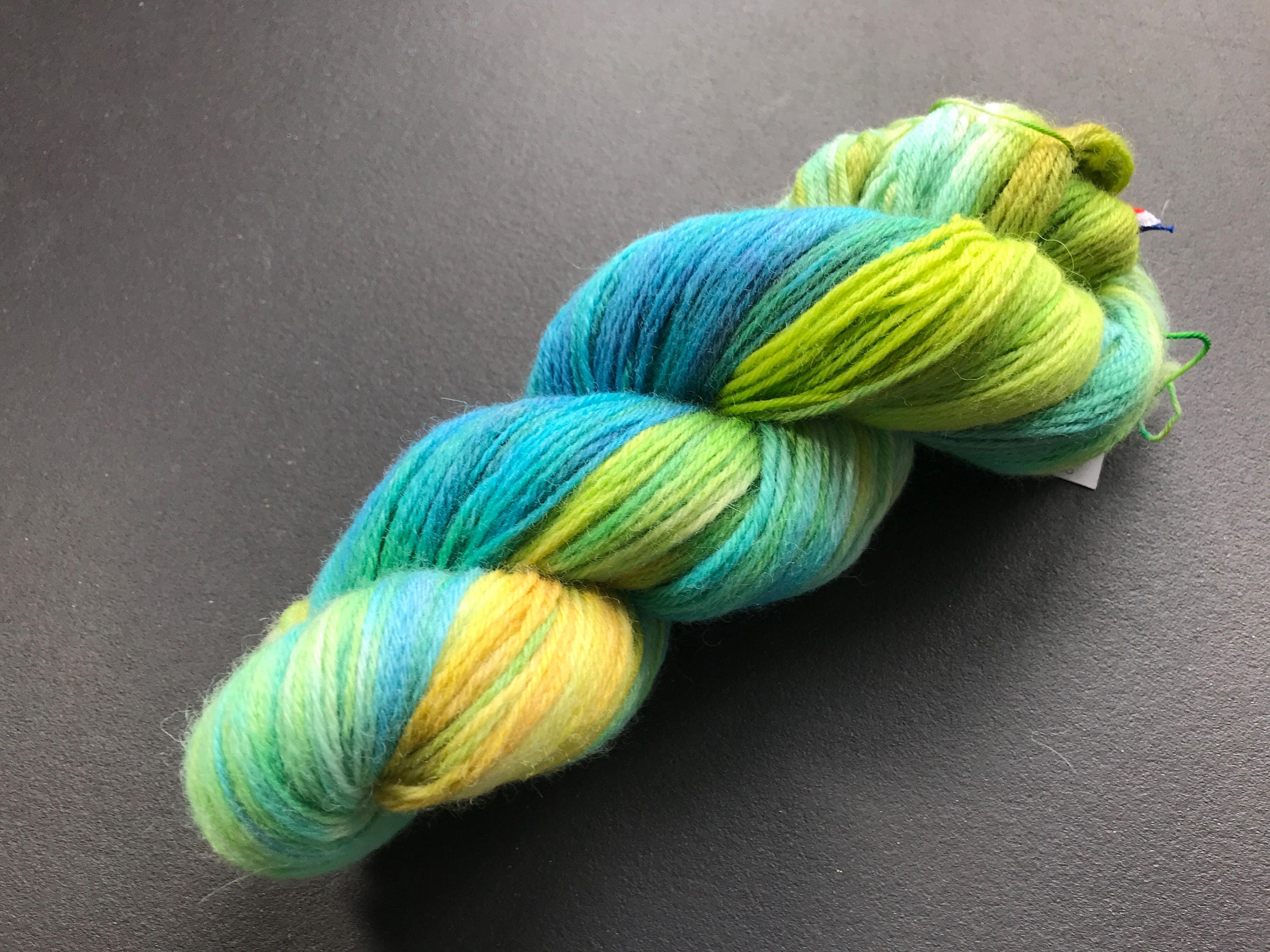 Hand dyed fine wool yarn 'made by Sjors II' in green, blue and yellow
