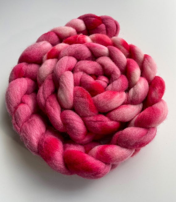 Hand dyed German Merino top 25 micron. Red and pink. Ideal for spinning or felting.