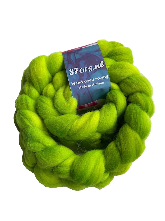 Hand dyed German Merino top 25 micron. Fluoriscent green . Ideal for spinning or felting.