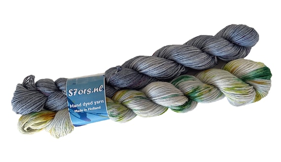 Hand dyed super wash BFL, alpaca and bio nylon sock weight duo colour set. Stone grey and speckled greens.