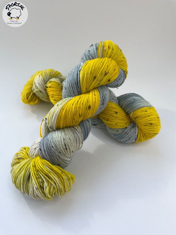 Hand dyed fingering weight Tweed yarn. Superwash Extrafine Merino, nylon and wool Neps. 'Mimi'.